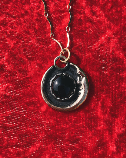 Onyx Brass Man in the Moon necklace