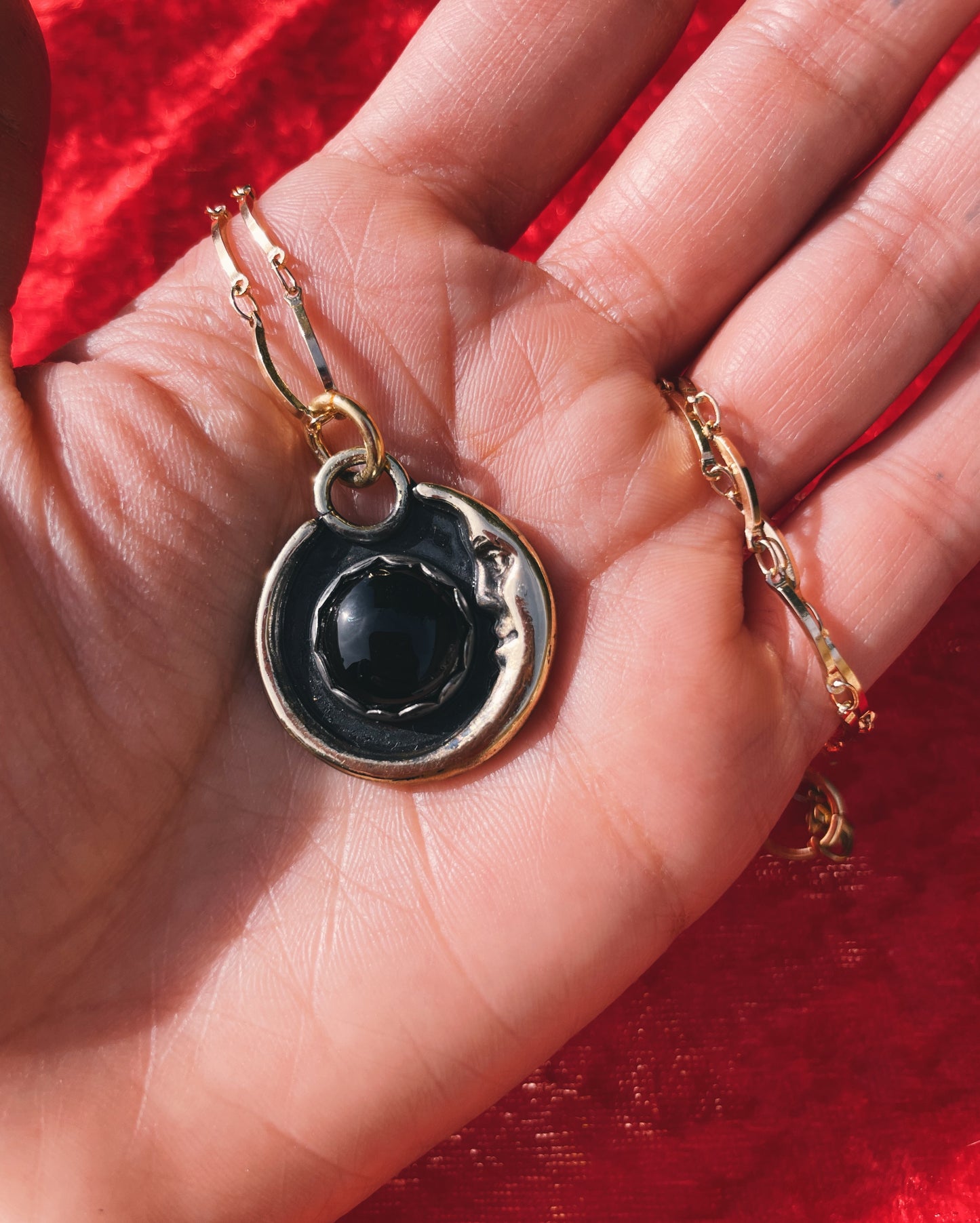 Onyx Brass Man in the Moon necklace