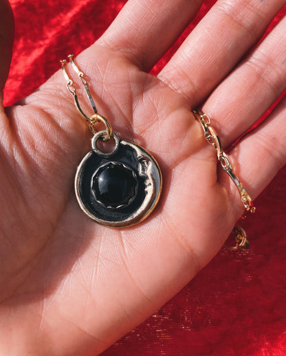 Onyx Brass Man in the Moon necklace