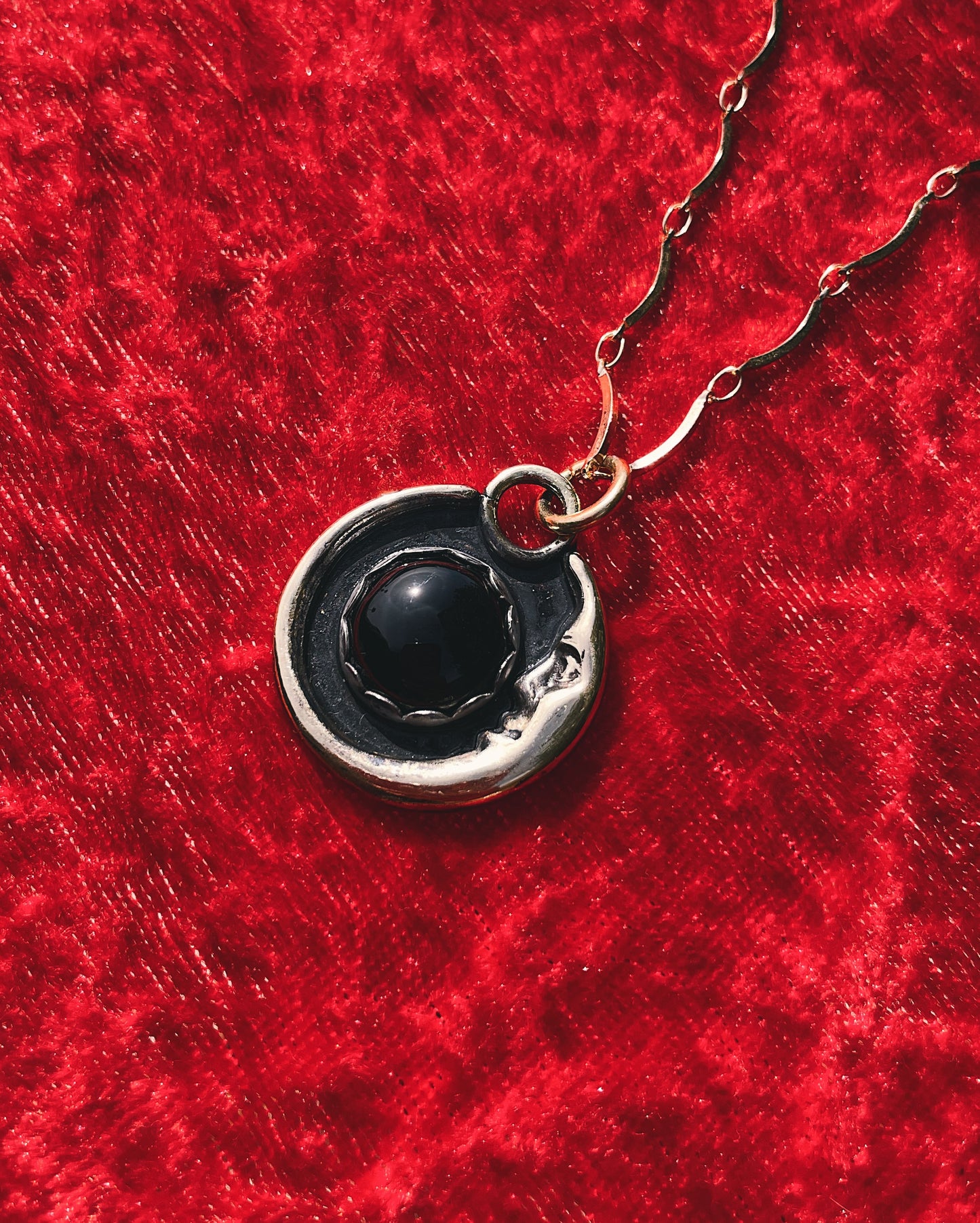 Onyx Brass Man in the Moon necklace