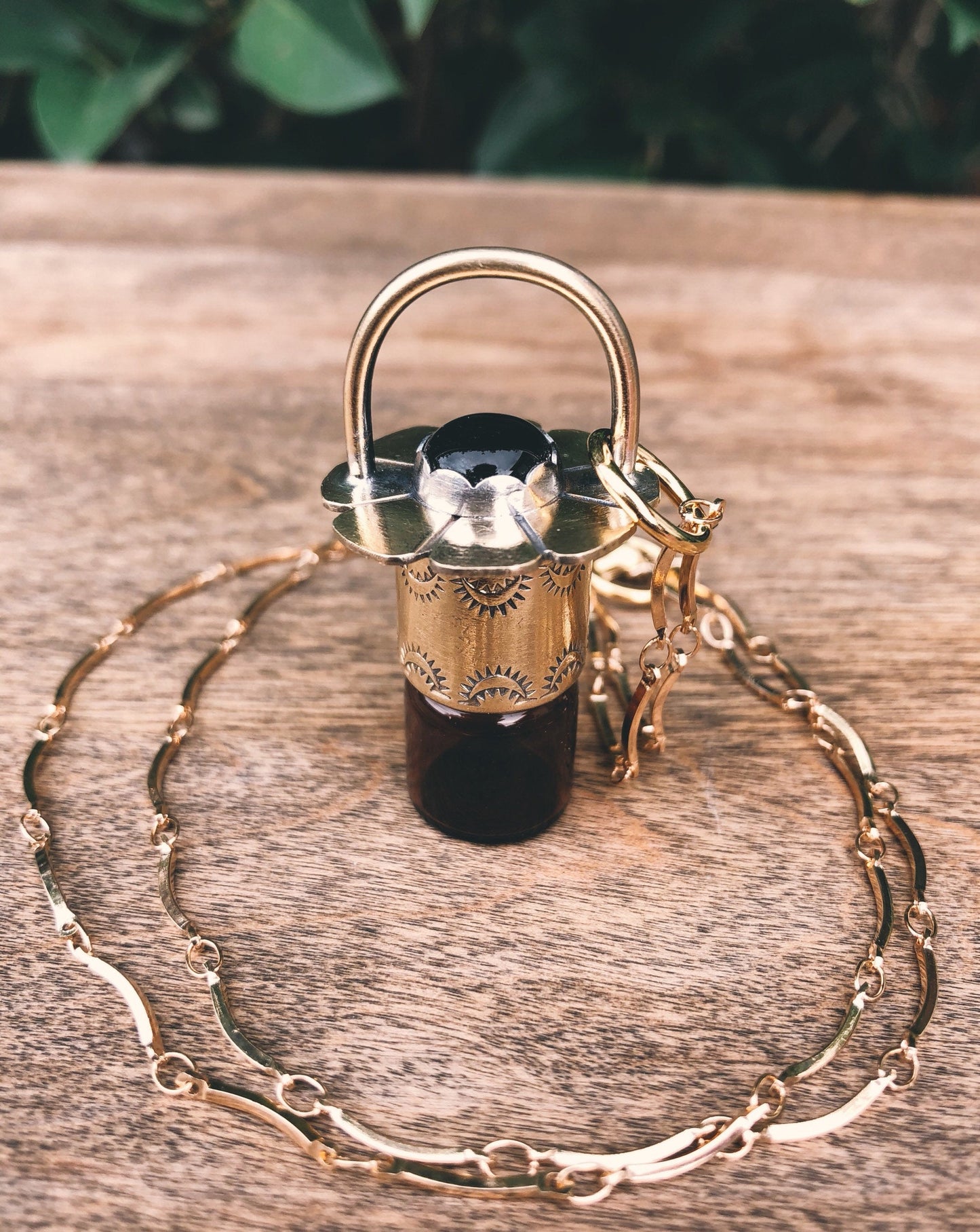 Brass Daisy - Black Onyx Rollerball Necklace