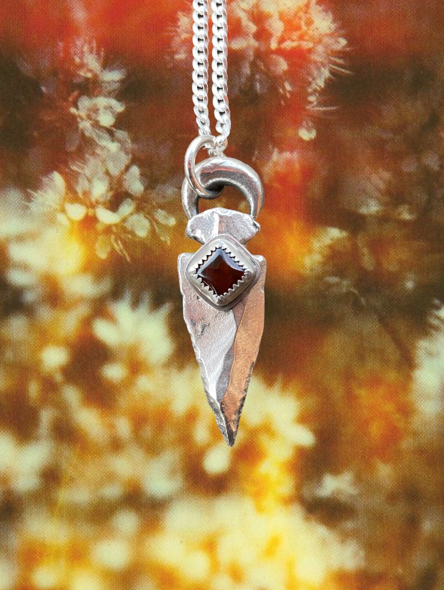 Crescent and Sterling Arrowhead with red agate
